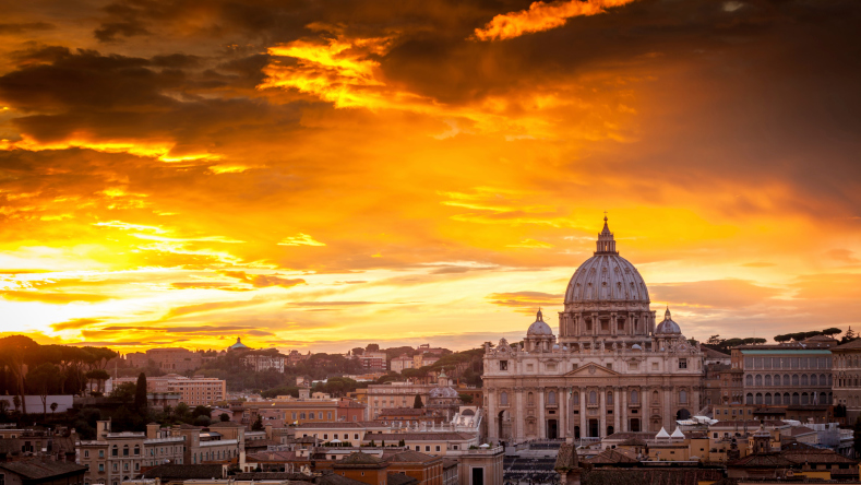 Basilica of St. Peter at sunset in Rome, Italy
