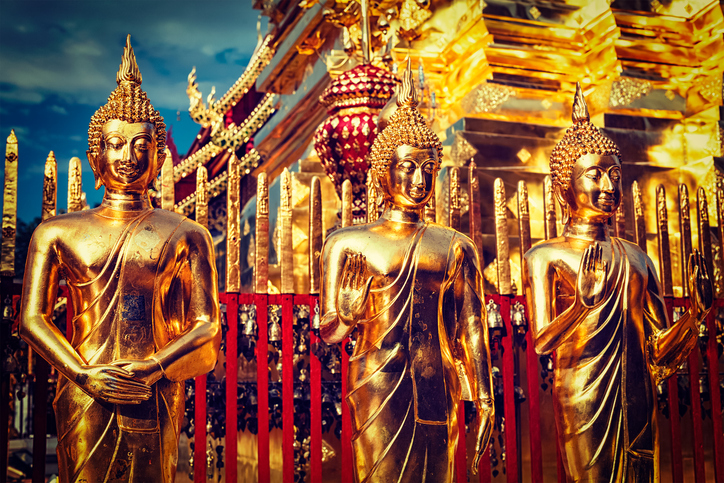 Travel Thailand Buddhism religion - vintage retro effect filtered hipster style image of gold Buddha statues in Wat Phra That Doi Suthep, Chiang Mai, Thailand