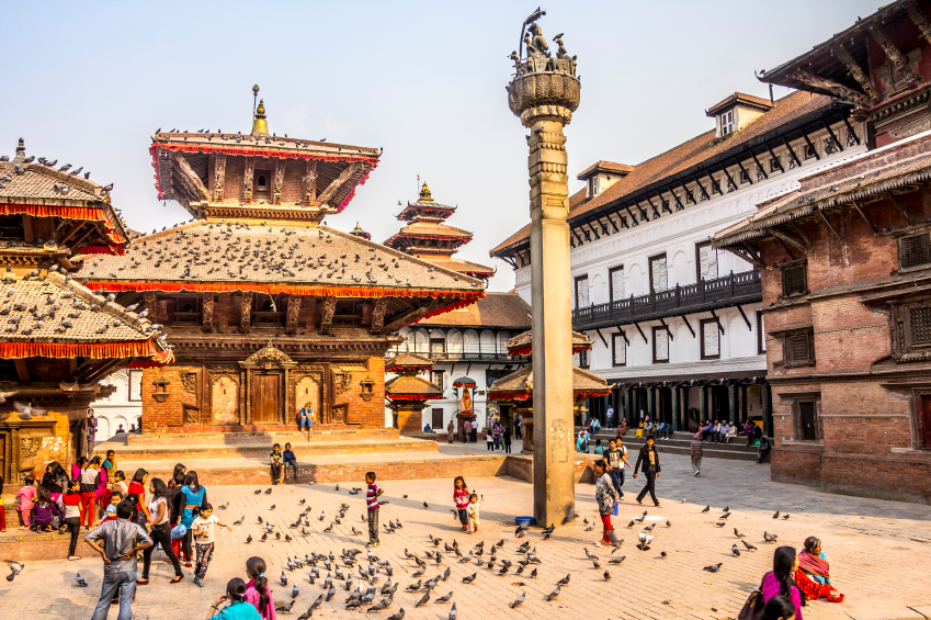 People, pigeons, pagodas and temples on Durbar square, Kathmandu, Nepal.