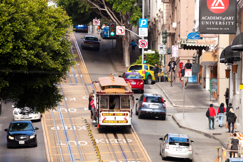 San Francisco-USA, November 14, 2014: The passengers are going from the station Hyde by the Cable car Tram to the Center of San Francisco. The Cable car is one of the San Francisco Attractions. Taken on Hyde street around 3pm, Nov 14, 2014