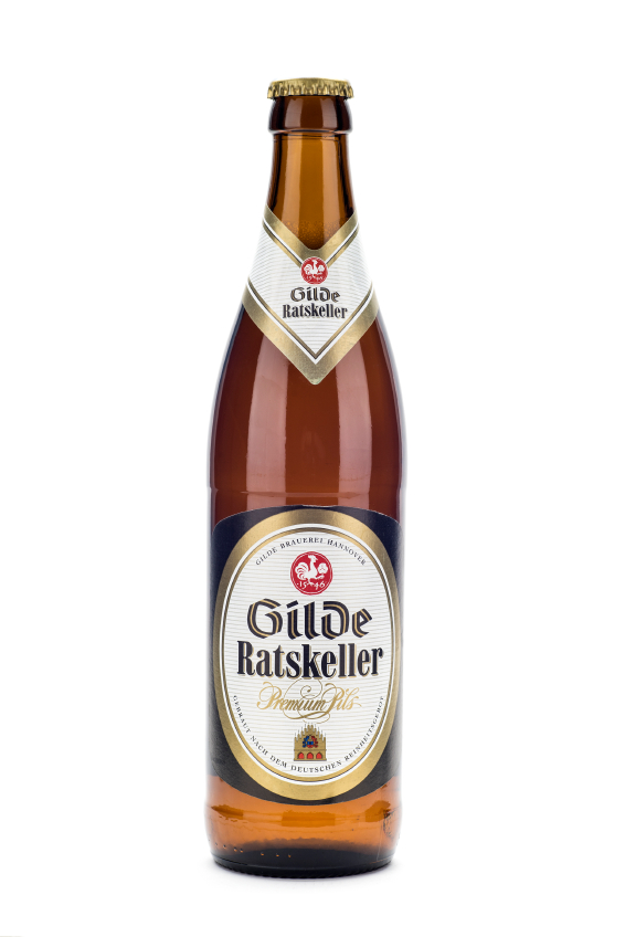 Hannover, Germany - March 27, 2015: Bottle of Gilde Ratskeller Premium Pilsener beer, is most popular beer in Hannover. Illustrative editorial.