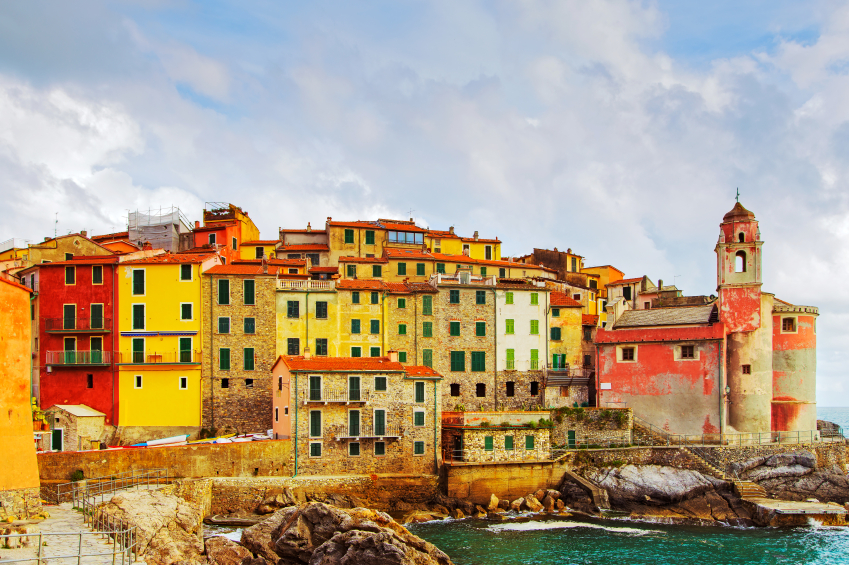 Tellaro rocks and old village on the sea. Church and houses. Five lands, Cinque Terre, Liguria Italy Europe.