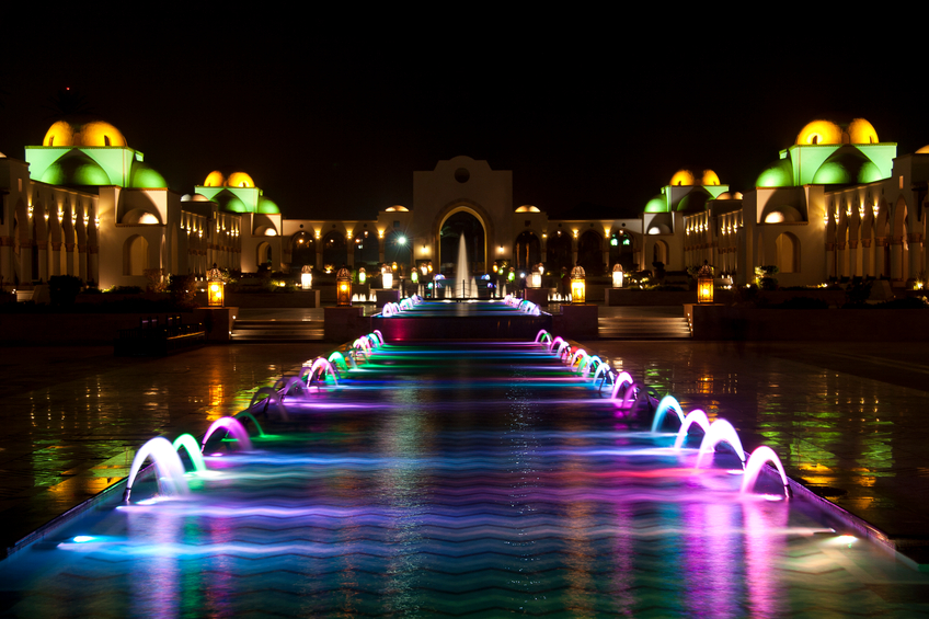 Dancing Multi Colored fountain at dark night