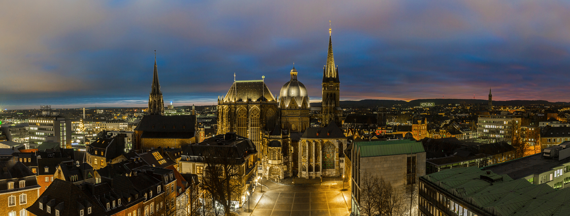 The cathedral in Aachen (Germany) at night with skyline panorama. Taken in outside with a 5D mark III.