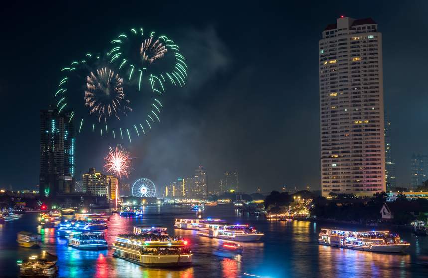 Bangkok, Thailand - January 1, 2016: New Year countdown fireworks celebration along Chaophraya river, view from Taksin bridge, center of Bangkok, Thailand, on January 1, 2016.