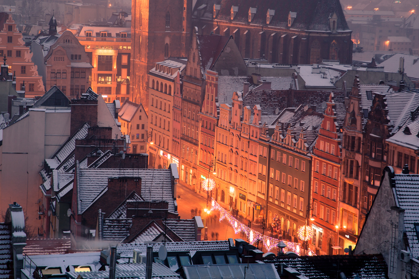 Wroclaw rofs in snow, christmas time, illumination on main old market.