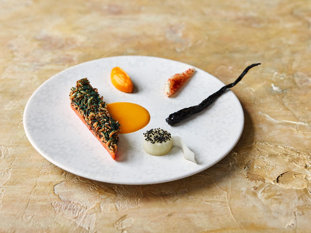 Tallerken med mat på restauranten Plates i London