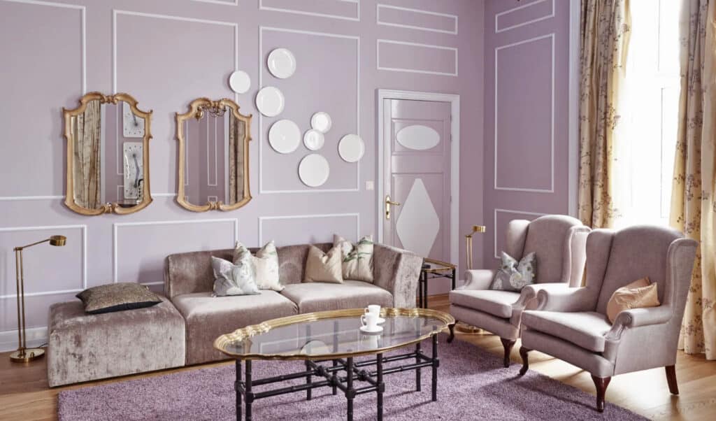 Grand Hotell i Oslo med unike rom, dette rommet er i rosa og med gull-detaljer.