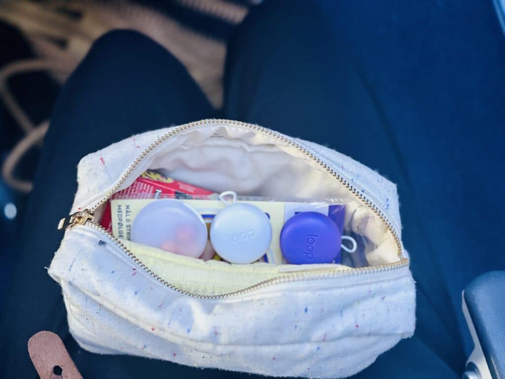 ørepropper i veske på fly